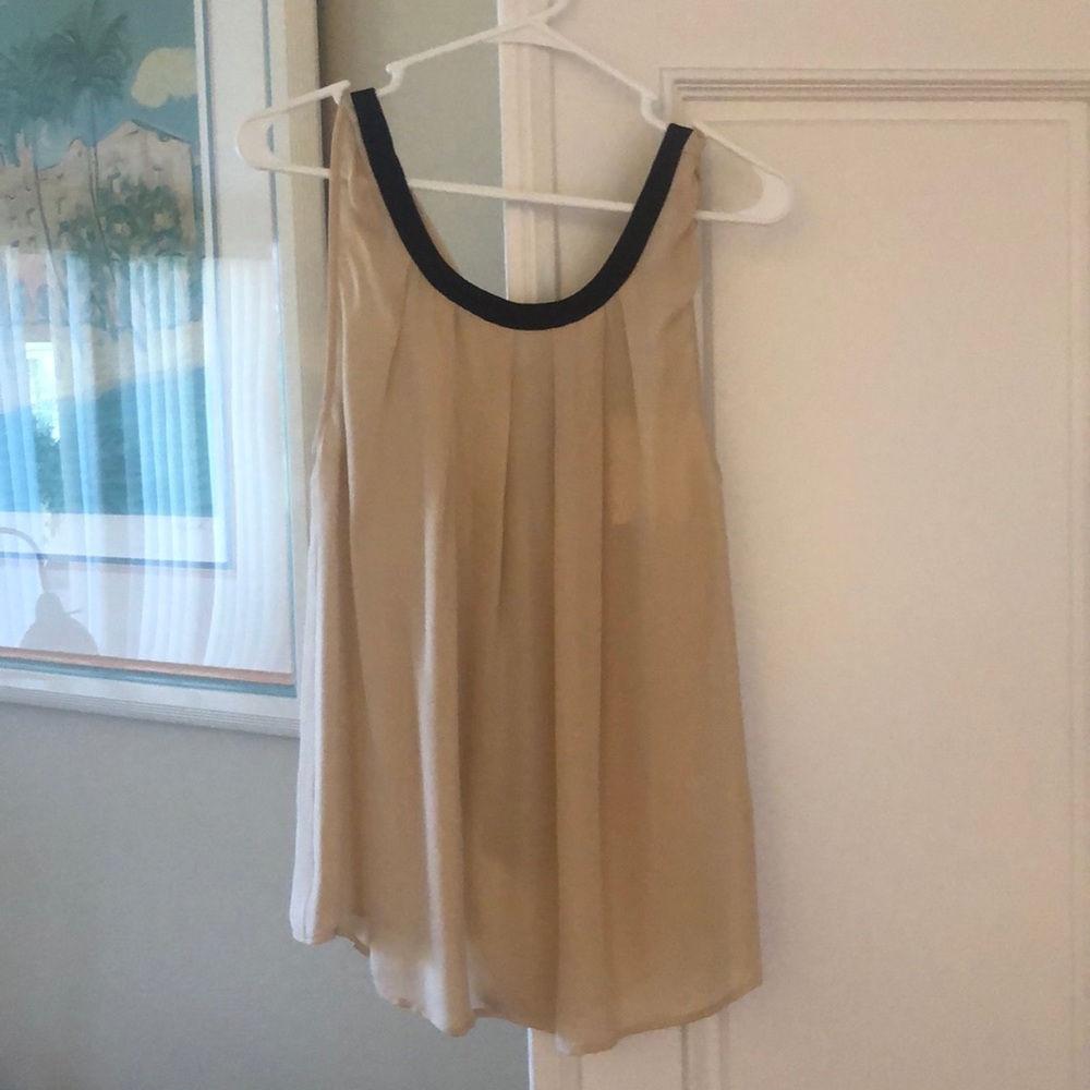 Pale pink with black trim and back tied blouse!